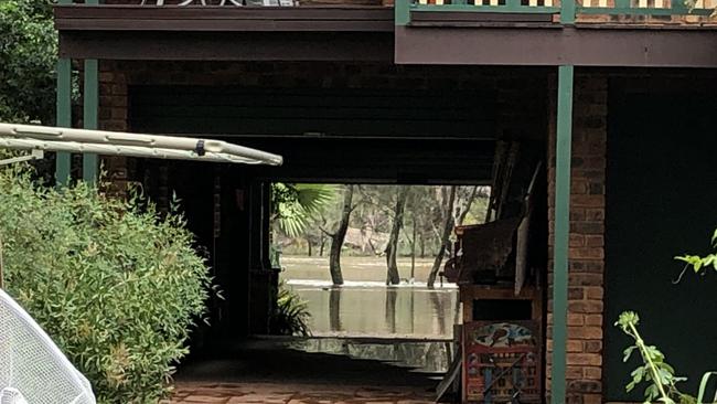 The Georges River flooded this home at Carinya Rd, Picnic Point.