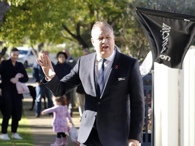 Auctioneer Ben Riddle calls for bids at an auction in Girton Crescent, Manifold Heights.