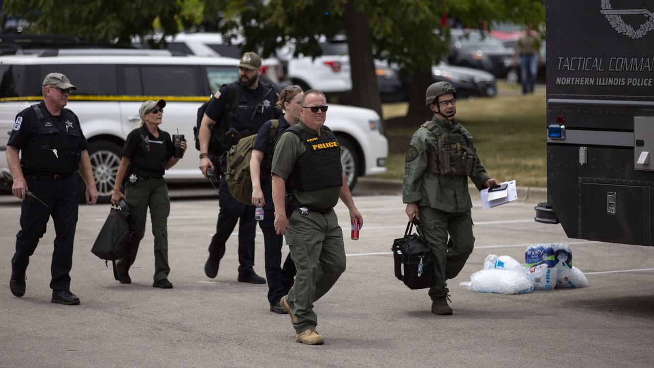 First responders work the scene of a shooting at a Fourth of July parade on July 4, 2022 in Highland Park, Illinois. Pictures: Jim Vondruska/Getty Images/AFP