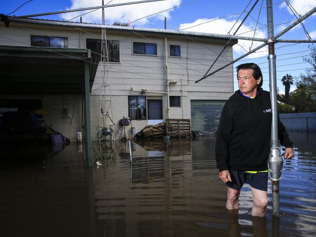Tim McCann in his flooded house on Browne St in Forbes. Picture: Dylan Robinson