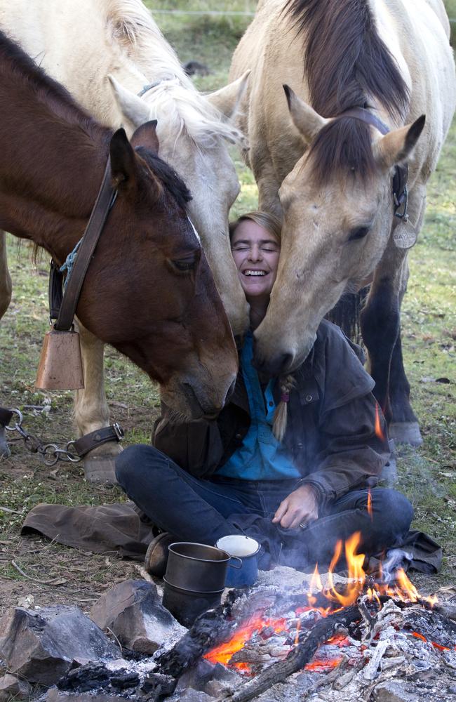 Language of love: Alienor with her three brumbies. Roxanne, on the left, was her ‘rock’. Picture: Cat Vinton