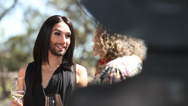 Eurovision winner Conchita Wurst samples a local white at d’Arenberg winery. Picture: Tait Schmaal