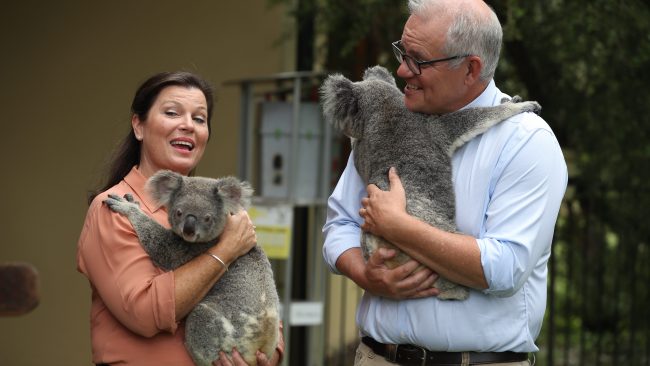 Prime Minister Scott Morrison and wife Jenny hold koalas at Australia Zoo after the government announced koala recovery funding. Picture: Annette Dew