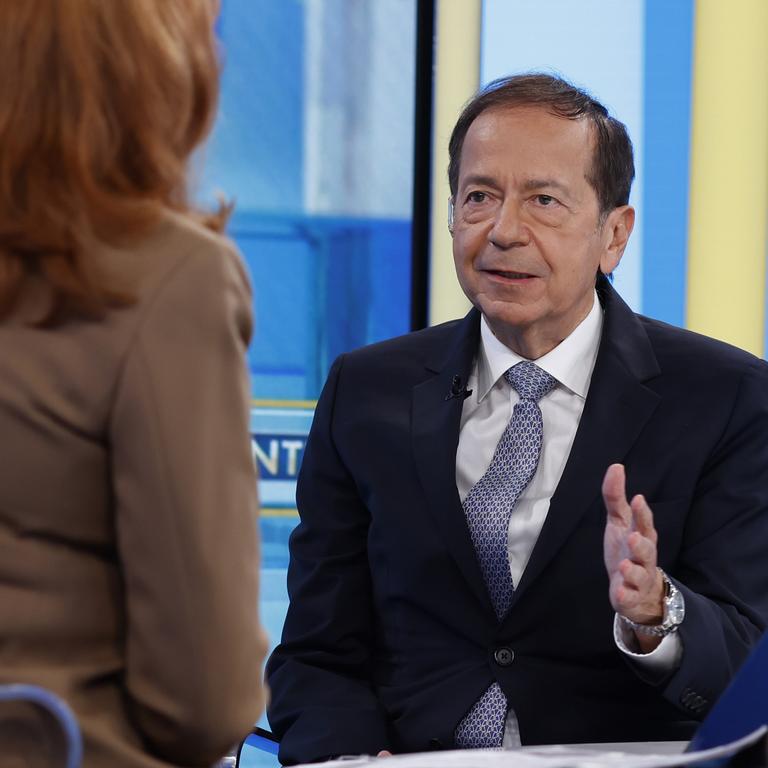 Liz Claman and John Paulson on set of 'The Claman Countdown' at Fox Business Network Studios on September 17. (Photo by Rob Kim/Getty Images)