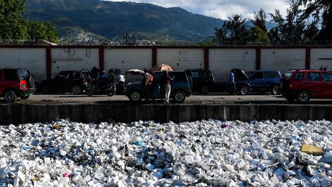 Plastic waste is seen floating on a sewage canal in the Haitian capital Port-au-Prince. Picture:  Chandan Khanna / AFP