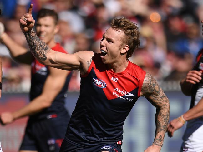 James Harmes of the Demons reacts after kicking a goal during the Round 21 AFL match between the Melbourne Demons and the St Kilda Saints at the MCG in Melbourne, Sunday, August 13, 2017. (AAP Image/Julian Smith) NO ARCHIVING, EDITORIAL USE ONLY