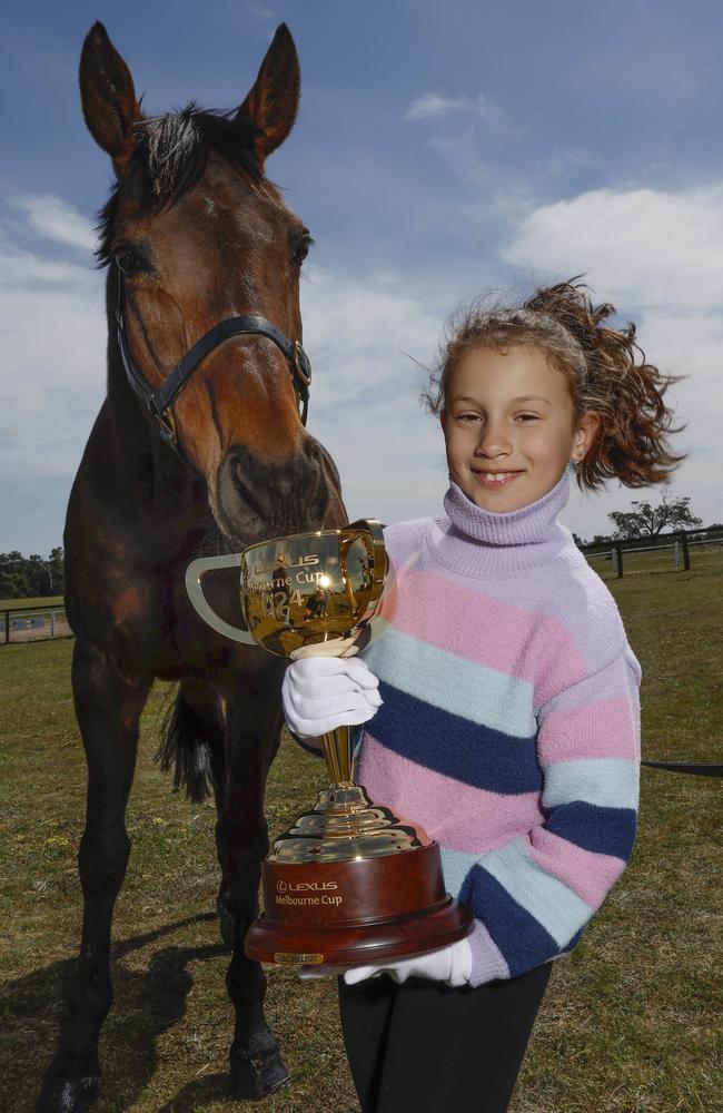 Seven-year-old Maddie Favaro with 2016 Melbourne Cup winner Almandin. Picture: Michael Klein