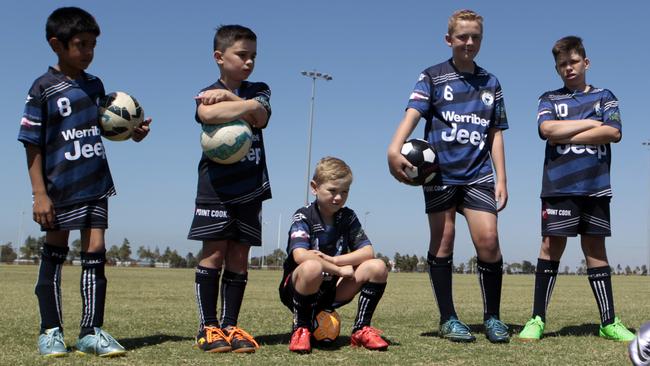 Children playing soccer in Point Cook. Left to right Sulaiman Saeed 8, Heath Aguis 7, Harrison Mill 7, Charlie Emery 12, Darcy Aguis 10, and Emily Gerolemou 9 Picture: Richard Serong