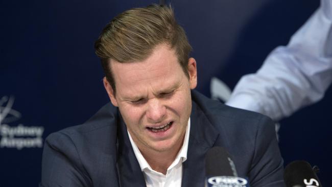 Dumped Australian captain Steve Smith in tears at a press conference at Sydney airport on Thursday night following his return from South Africa.