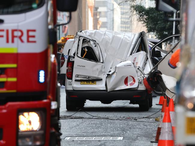 Two people inside the van escaped injury. Picture: NewsWire / Damian Shaw