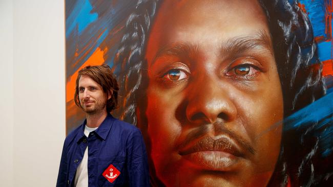 Matt Adnate was awarded the Archibald Packing Room Prize for his portrait of Baker Boy at he Art Gallery of NSW on Thursday. Picture: NCA NewsWire / Nikki Short