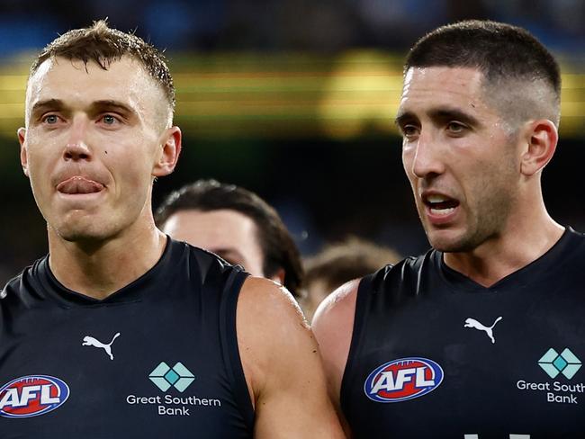 MELBOURNE, AUSTRALIA – MARCH 13: Patrick Cripps (left) and Jacob Weitering of the Blues look dejected after a loss during the 2025 AFL Round 01 match between the Richmond Tigers and the Carlton Blues at the Melbourne Cricket Ground on March 13, 2025 in Melbourne, Australia. (Photo by Michael Willson/AFL Photos via Getty Images)
