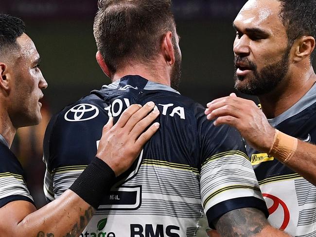 BRISBANE, AUSTRALIA - SEPTEMBER 24: Kyle Feldt of the Cowboys celebrates scoring a try during the round 20 NRL match between the Brisbane Broncos and the North Queensland Cowboys at Suncorp Stadium on September 24, 2020 in Brisbane, Australia. (Photo by Bradley Kanaris/Getty Images)