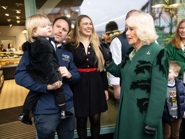 Queen Camilla meets one year old Fitz William Salmon-Corrie as she visits Knotts bakery on in Belfast. Picture: Getty Images