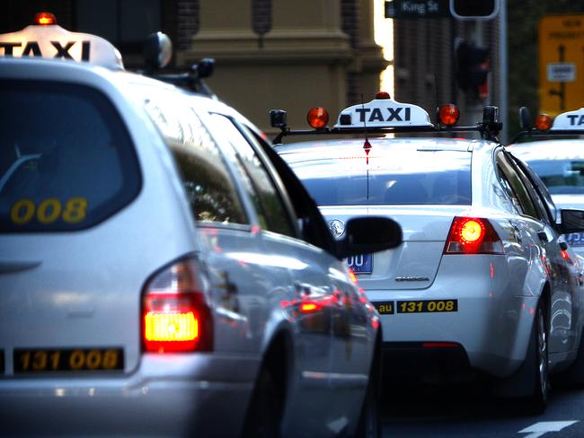 Generic pic of taxi cabs in peak hour traffic in the Sydney CBD.