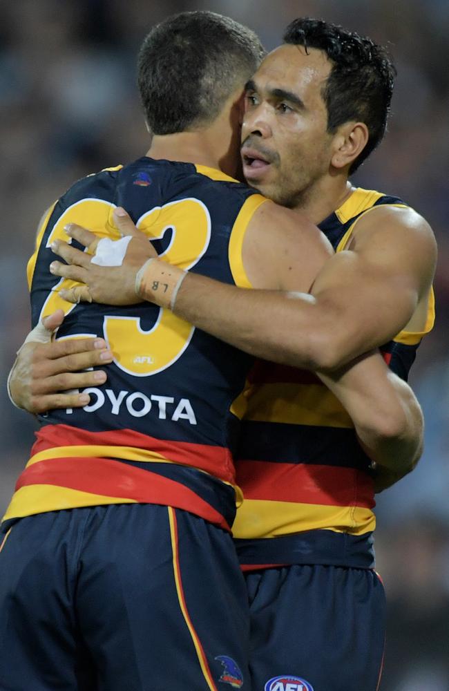 Charlie Cameron and Eddie Betts celebrate a goal.