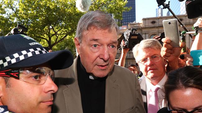 Cardinal George Pell arrives at Melbourne County Court yesterday. Picture: Michael Dodge/Getty Images