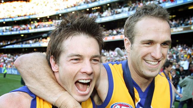 Ben Cousins and Chris Judd soak up the spoils of West Coast’s 2006 premiership.