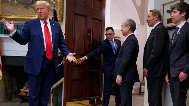 WASHINGTON, DC - JANUARY 21: U.S. President Donald Trump, accompanied by (R-L) , OpenAI CEO Sam Altman, SoftBank CEO Masayoshi Son, and Oracle CTO Larry Ellison speaks as he leaves a news conference in the Roosevelt Room of the White House on January 21, 2025 in Washington, DC. Trump announced an investment in artificial intelligence (AI) infrastructure and took questions on a range of topics including his presidential pardons of Jan. 6 defendants, the war in Ukraine, cryptocurrencies and other topics. (Photo by Andrew Harnik/Getty Images)