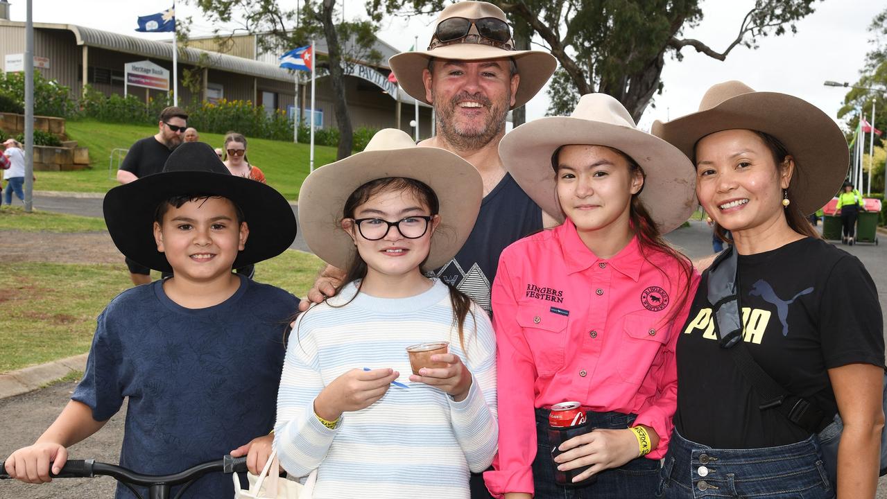 Rob Bradley and his family, from left; children Ty, Taya and Tiann and his wife Truc Bradley. Meatstock Festival, Toowoomba showgrounds. April 2022