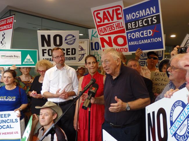 Anti-amalgamation campaigners, the Save Our Councils Coalition, rally outside the former North Shore electorate office of former MP Jillian Skinner on February 5. Pictured, Mosman mayor Peter Abelson and SOCC president and Mosman councillor Carolyn Corrigan. Picture: Will Tuck