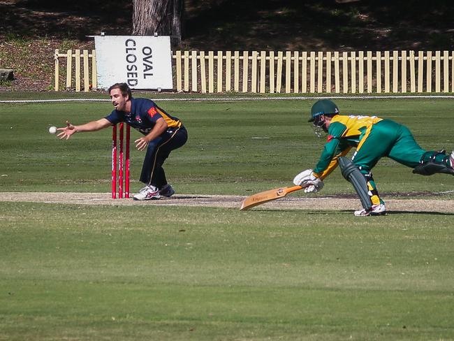 Hawkesbury’s Jake Wholohan tries to make his ground. Picture: Kate Zarifeh