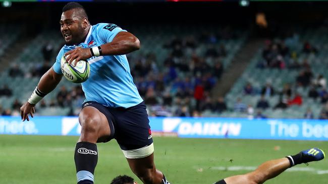 Rampaging Waratahs winger Taqele Naiyaravoro has already equalled the Super Rugby record for most tries in a season and plans to break it against the Highlanders on Saturday. Picture: Getty