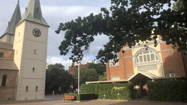 The hall sits alongside the cathedral.