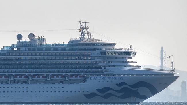 The Diamond Princess cruise ship with about 3,700 people on board sits anchored in quarantine off the port of Yokohama after a number of passengers were confirmed to be infected with the Wuhan coronavirus. Photo: Carl Court, Getty Images.