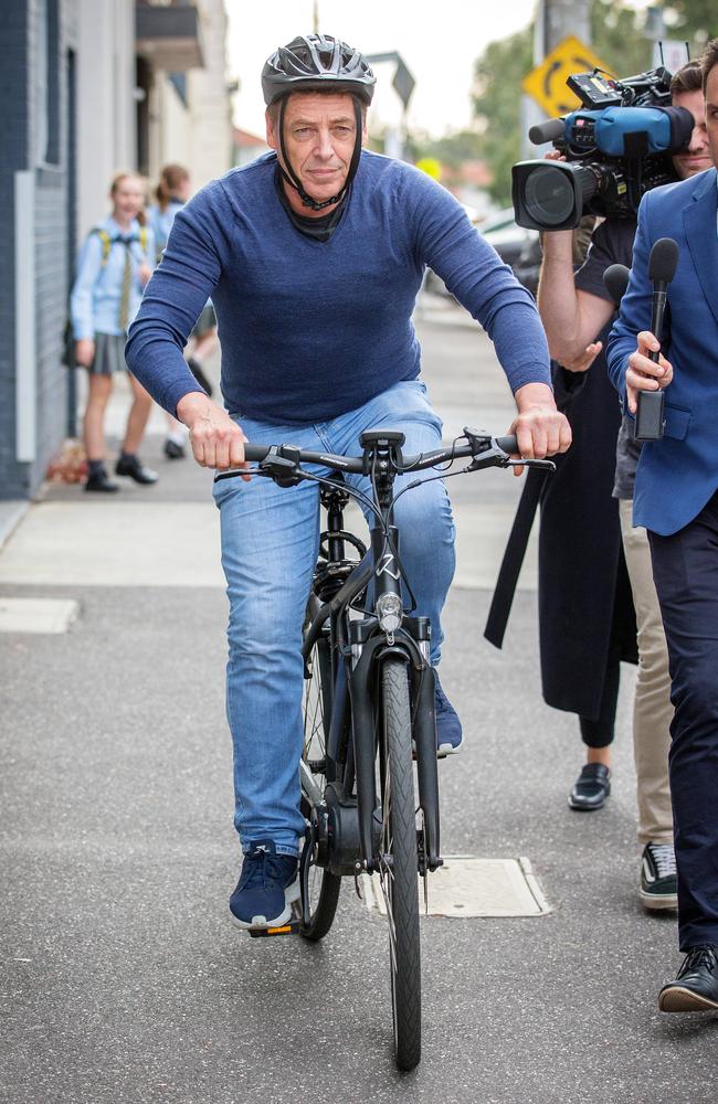 Mark Bomber Thompson leaves his Port Melbourne warehouse the day after being released from Police custody. Picture: Mark Stewart