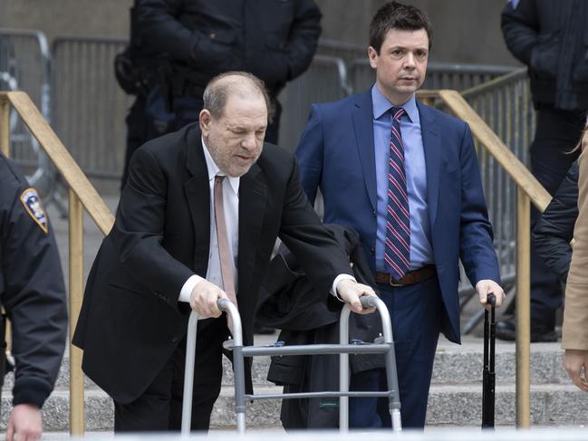 Harvey Weinstein, center, leaves court for the day with his attorneys and Donna Rotunno, right, and Damon Cheronis, second from right, during jury selection in his trial on rape and sexual assault charges, Tuesday, Jan. 14, 2020, in New York. Jury selection continues Wednesday. (AP Photo/Mary Altaffer)