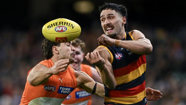 ADELAIDE, AUSTRALIA – JUNE 29: Izak Rankine of the Crows handballs during the round 16 AFL match between Adelaide Crows and Greater Western Sydney Giants at Adelaide Oval, on June 29, 2024, in Adelaide, Australia. (Photo by Mark Brake/Getty Images)
