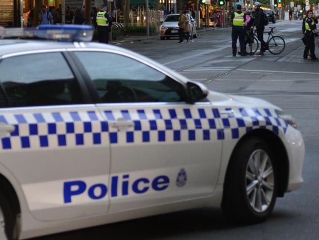 Generic Police  / cop stock photos.  MELBOURNE, AUSTRALIA - NOVEMBER 9: Police take security measurement after a man has been shot by police after setting his car on fire and stabbing several people in  Melbourne, Australia on November 9, 2018. At least one person is killed, three others injured in the attack. (Photo by Recep Sakar/Anadolu Agency/Getty Images)