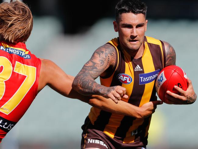 ADELAIDE, AUSTRALIA - SEPTEMBER 20: Chad Wingard of the Hawks is tackled by Jeremy Sharp of the Suns during the 2020 AFL Round 18 match between the Hawthorn Hawks and the Gold Coast Suns at Adelaide Oval on September 20, 2020 in Adelaide, Australia. (Photo by Matt Turner/AFL Photos via Getty Images)