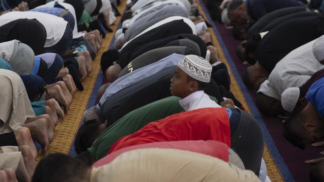 Australian Lebanese Muslims seen praying at Sydney’s Lakemba Mosque. Picture: Jeremy Piper