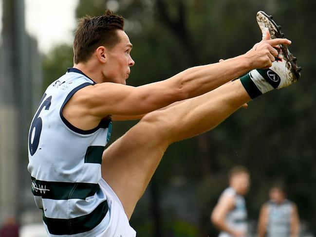 Mickey Nicholls of Old Geelong kicks during the round eight 2023 Premier B Men's match between De La Salle and Old Geelong at Waverley Oval in Malvern East, Victoria on June 3, 2023. (Photo by Josh Chadwick)