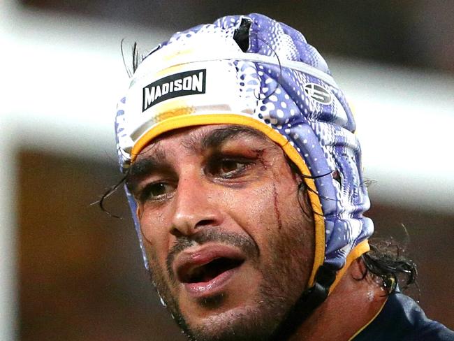 Cowboys Johnathan Thurston and Broncos Just Hodges talk with the refs. The Brisbane Broncos vs the North Queensland Cowboys at Suncorp Stadium. Pic Peter Wallis