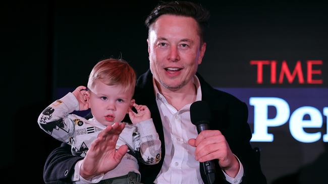 Elon Musk and one of his seven children. (Photo by Theo Wargo/Getty Images for TIME)