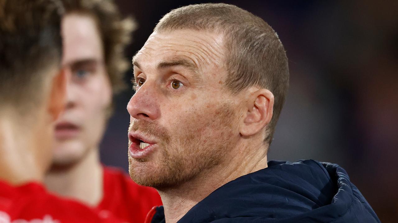 MELBOURNE, AUSTRALIA - AUGUST 02: Simon Goodwin, Senior Coach of the Demons addresses his players during the 2024 AFL Round 21 match between Footscray and the Melbourne Demons at Marvel Stadium on August 02, 2024 in Melbourne, Australia. (Photo by Michael Willson/AFL Photos via Getty Images)