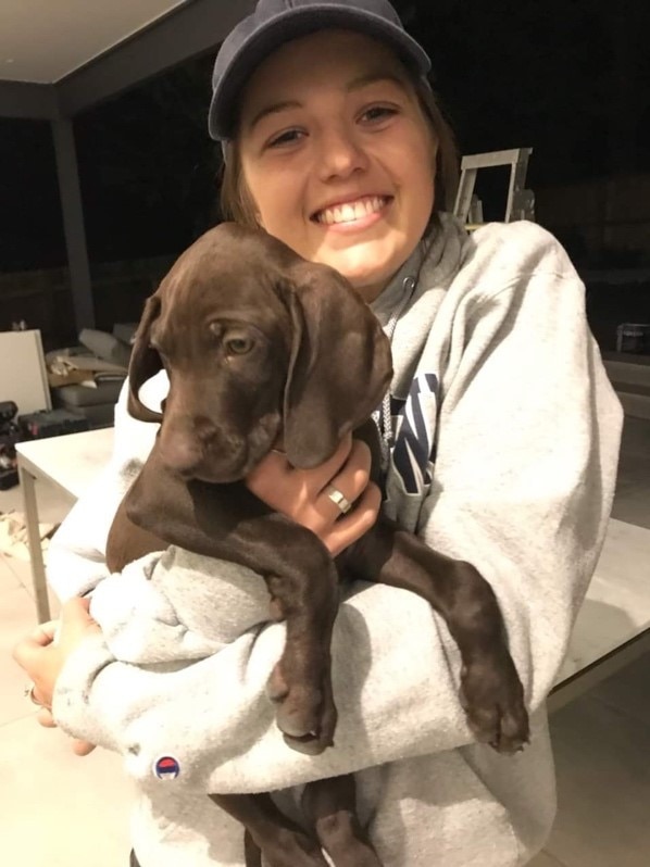 The Sydney resident, pictured with her puppy Fletch that she received as her Make-A-Wish gift in 2018, said she chose to view life in a positive way. Picture: Supplied via NCA NewsWire