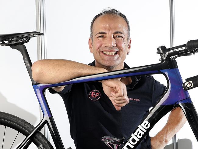 CYCLING - TOUR DOWN UNDER - Education First Mechanic Michele Primaro in the Tour Village working on team bikes. Picture SARAH REED