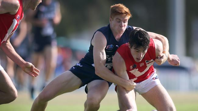 Haines lays a tackle during his time with South Adelaide. Picture: Dean Martin