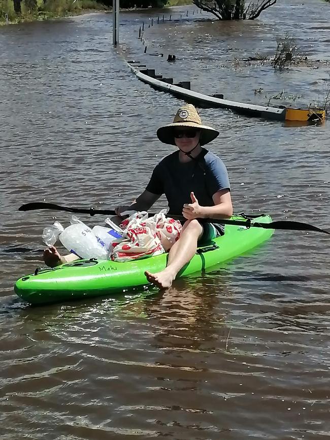 Flooding didn’t stop this resident’s grocery run. Picture: Facebook/Ivan Wrzos.