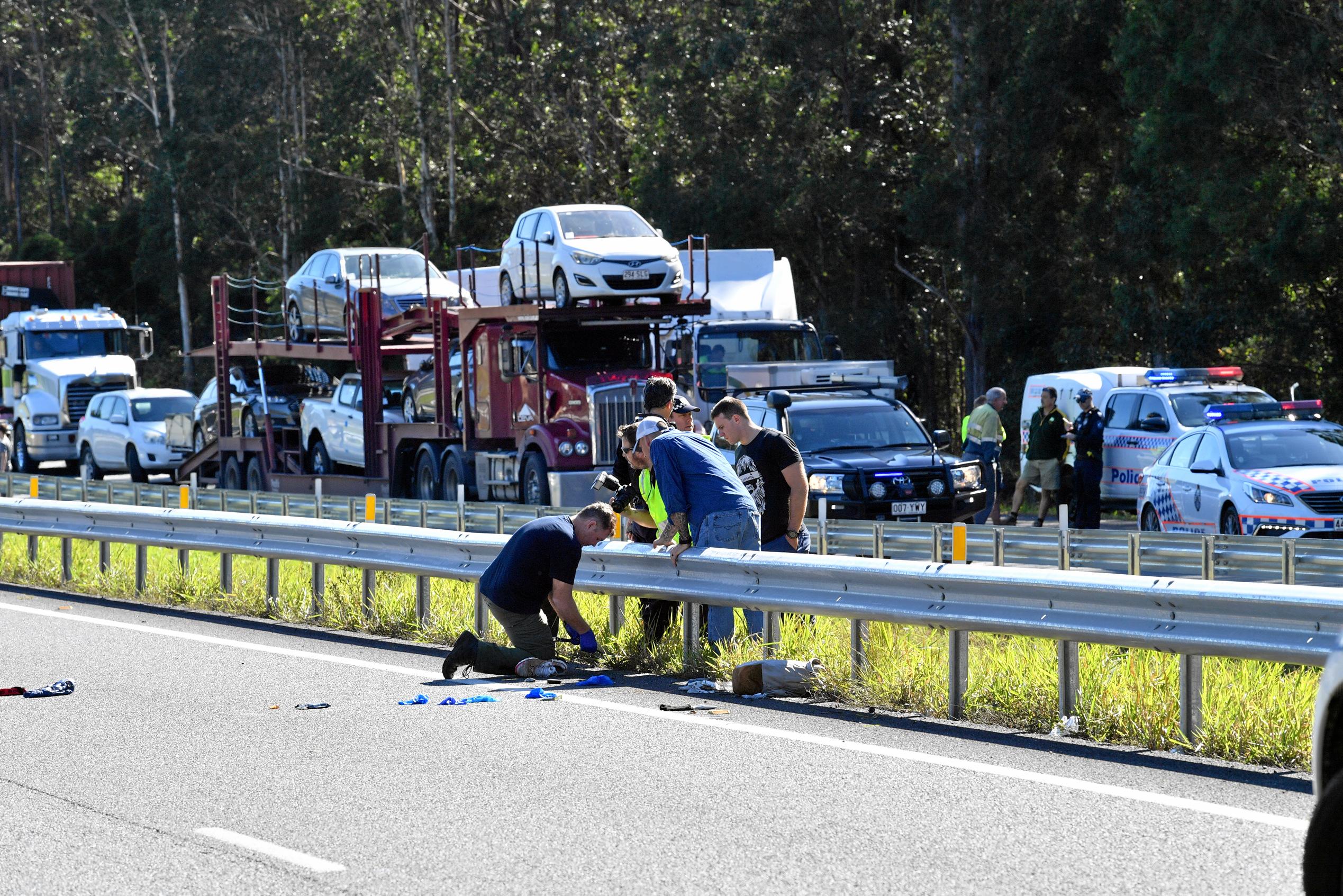 The police chased a car from north of Gympie and dozens of police apprehended a man near Parklands, just north of Nambour on the Bruce Highway. Traffic was stopped in both directions for several hours.