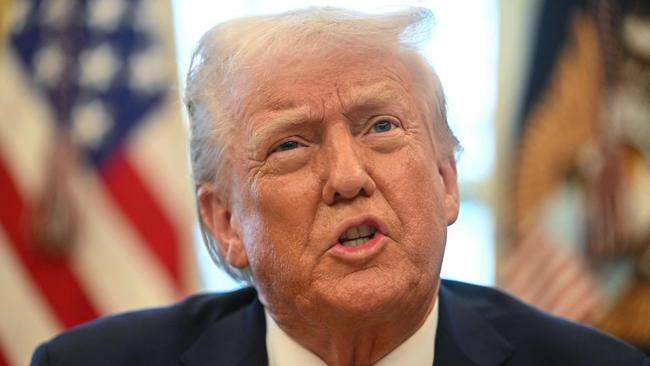 US President Donald Trump speaks to the press after signing an executive order to create a US sovereign wealth fund, in the Oval Office of the White House on February 3, 2025, in Washington, DC. (Photo by Jim WATSON / AFP)