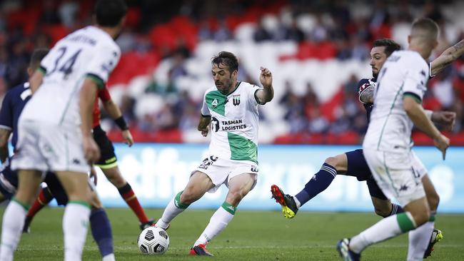 Victor Sanchez, centre, of Western United kicks a goal during the A-League match between the Melbourne Victory and Western United at Marvel Stadium on Saturday. Picture: Daniel Pockett/Getty Images