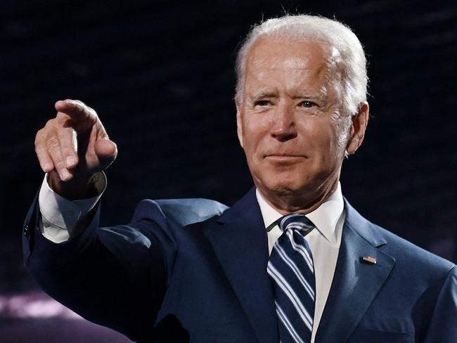 (FILES) Former vice-president and Democratic presidential nominee Joe Biden and his wife Former Second Lady of the United States doctor Jill Biden stand on stage at the end of the third day of the Democratic National Convention, being held virtually amid the novel coronavirus pandemic, at the Chase Center in Wilmington, Delaware on August 19, 2020. Joe Biden on July 21, 2024 dropped out of the US presidential election and endorsed Vice President Kamala Harris as the Democratic Party's new nominee, in a stunning move that upends an already extraordinary 2024 race for the White House. Biden, 81, said he was acting in the "best interest of my party and the country" by bowing to weeks of pressure after a disastrous June debate against Donald Trump stoked worries about his age and mental fitness. (Photo by Olivier DOULIERY / AFP)