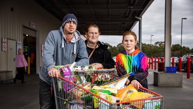 Shanna and Brett Laffin with daughter Phoenix, 10, are trying to save money with the rising cost of groceries. Picture: Tom Huntley