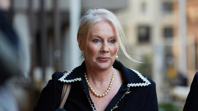 Shari-Lea Hitchcock arrives at the Downing Centre Local Courts in Sydney, Wednesday, July 11, 2018. Ms Hitchcock is pleading not guilty to common assault, assaulting police and resisting arrest after allegedly assaulting a stranger who tried to help her across Oxford Street before biting a young female constable in March 2016. (AAP Image/Erik Anderson) NO ARCHIVING