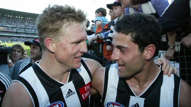 Nathan Buckley and Paul Licuria leave the MCG after winning the preliminary final over Adelaide in 2002.